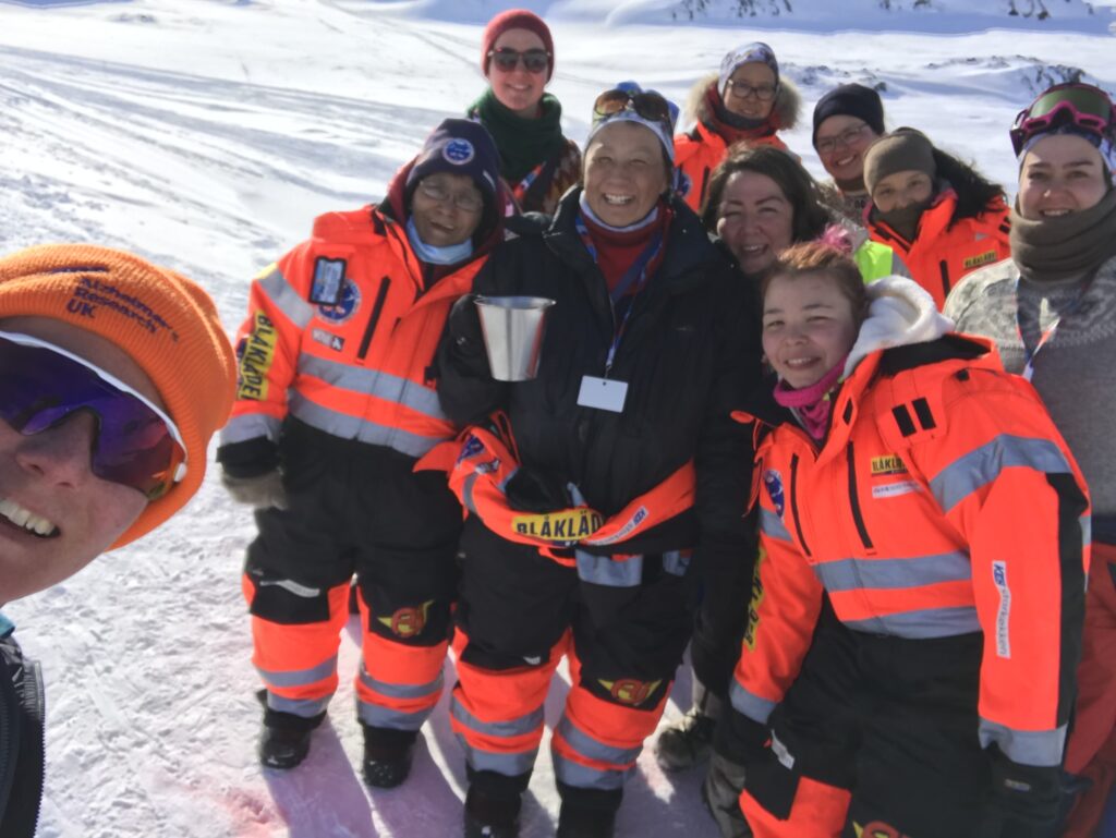 Inuit woman who taught Leanne about recovery through a hug, with the Arctic Circle Ski Race support crew.